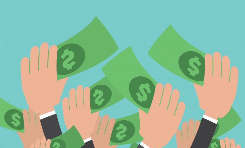 Hands grabbing money