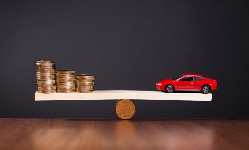 Car and coins balancing