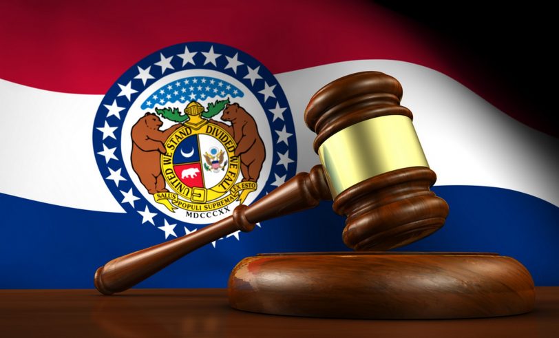 Gavel in front of Missouri flag
