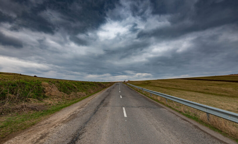 Storm clouds over highway