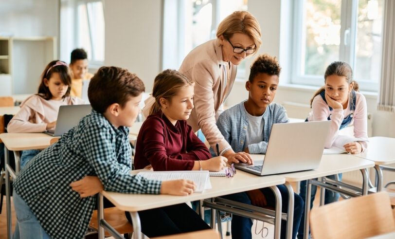 Teacher with students