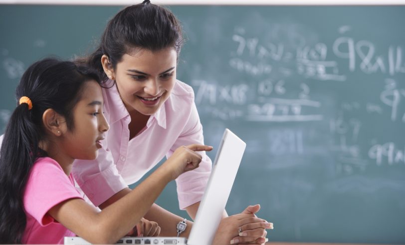 Teacher with student